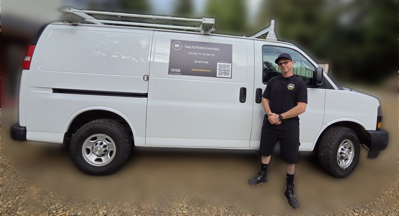Casey Winters standing beside his Casey J. Winters Construction work van in Tillamook, Oregon