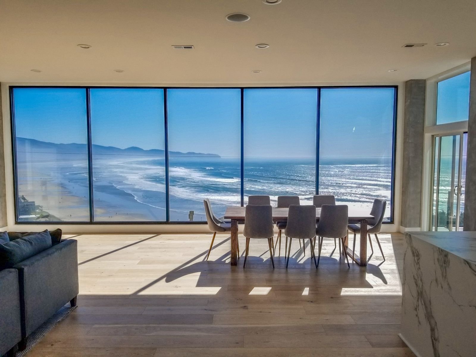 Beach house multi-floor trim and cabinet installation