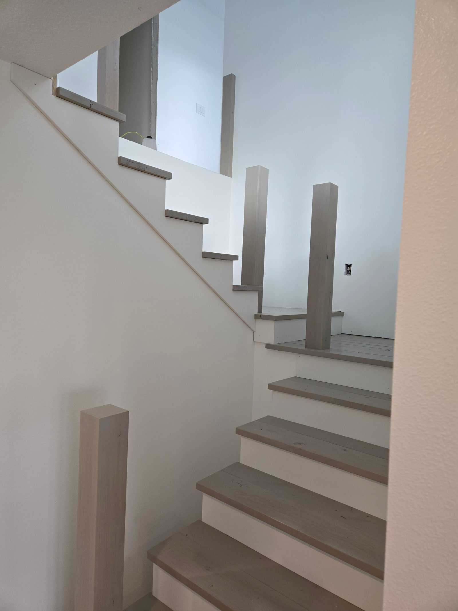 Staircase with custom stain finish on alder