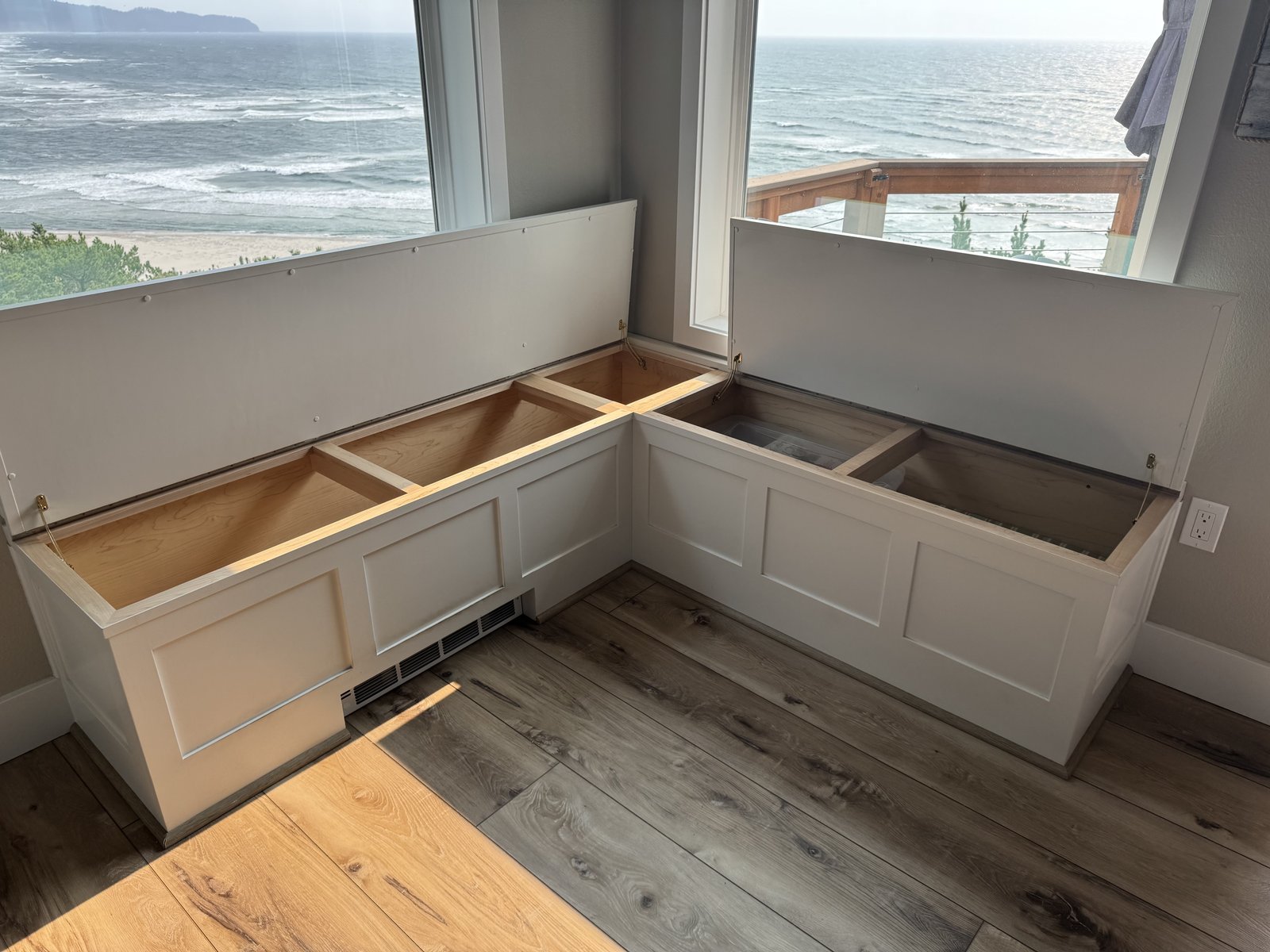 Storage bench with both lids open showing divided compartments