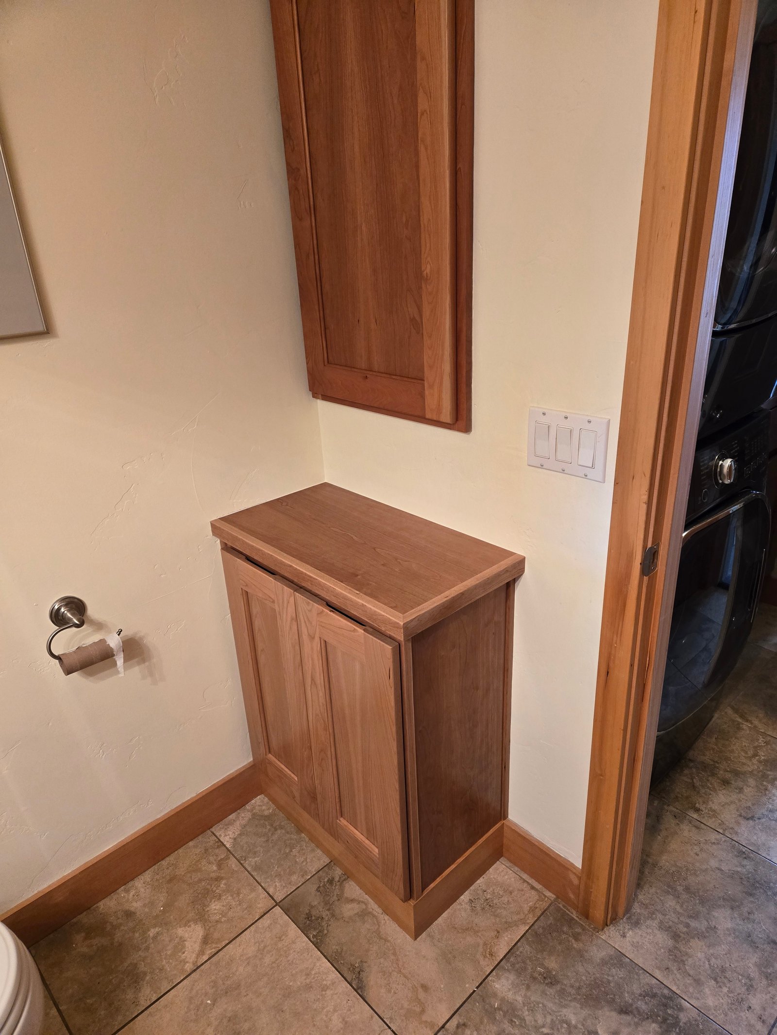 Completed cherry bypass cabinet with library ladder Tillamook Oregon