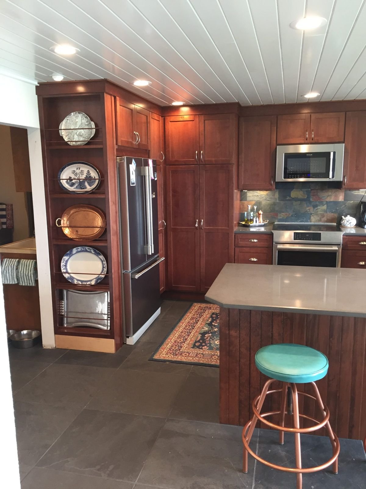 Custom cabinetry and tongue and groove ceiling installation