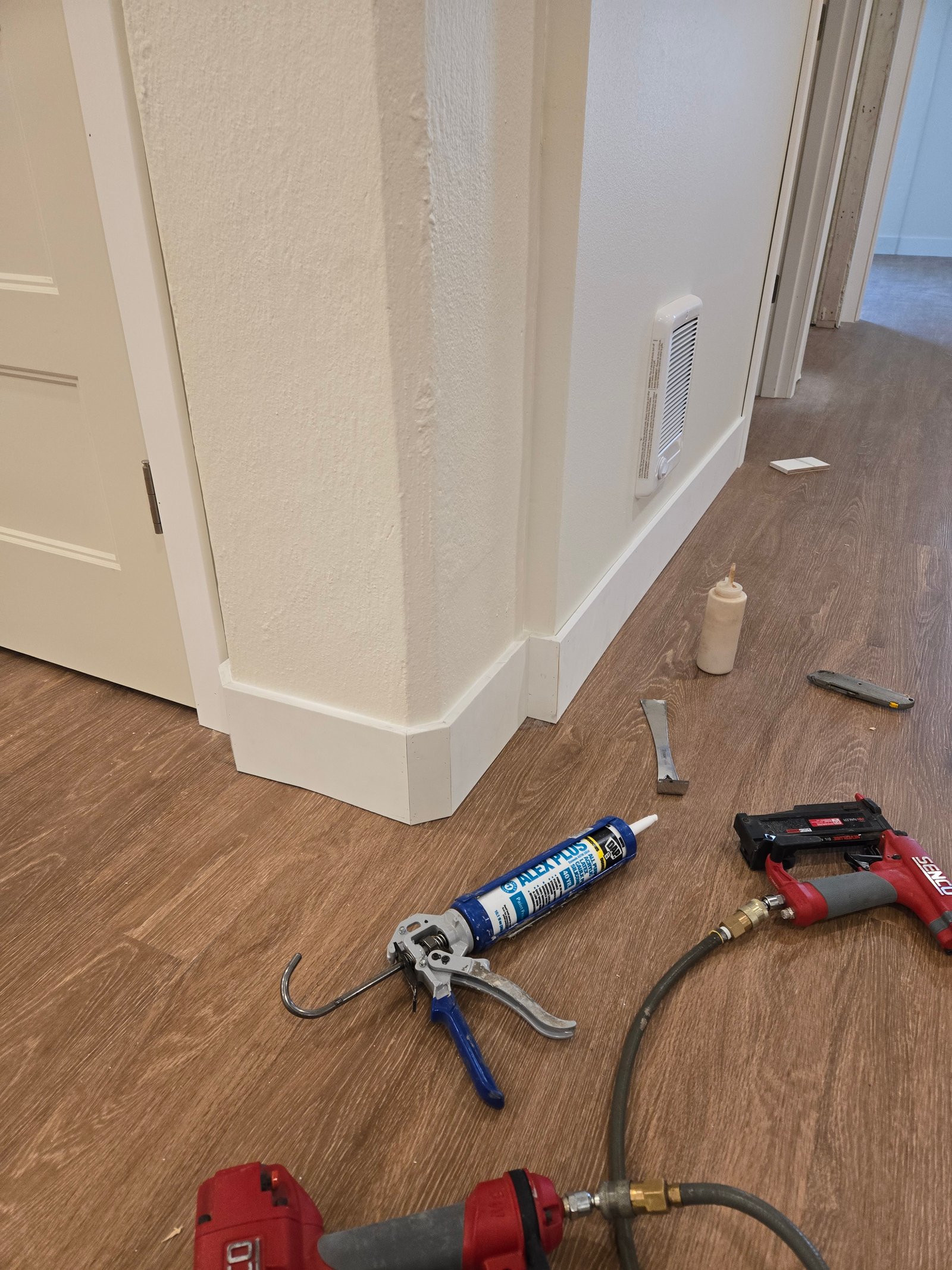 Custom trim wrapping concrete column